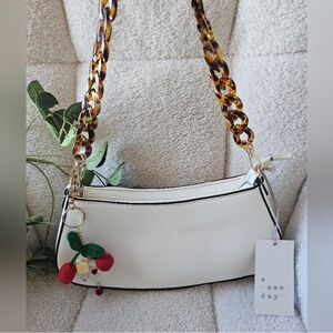 Cream Shoulder Bag with Tortoise Chain Strap and Cherry Charm